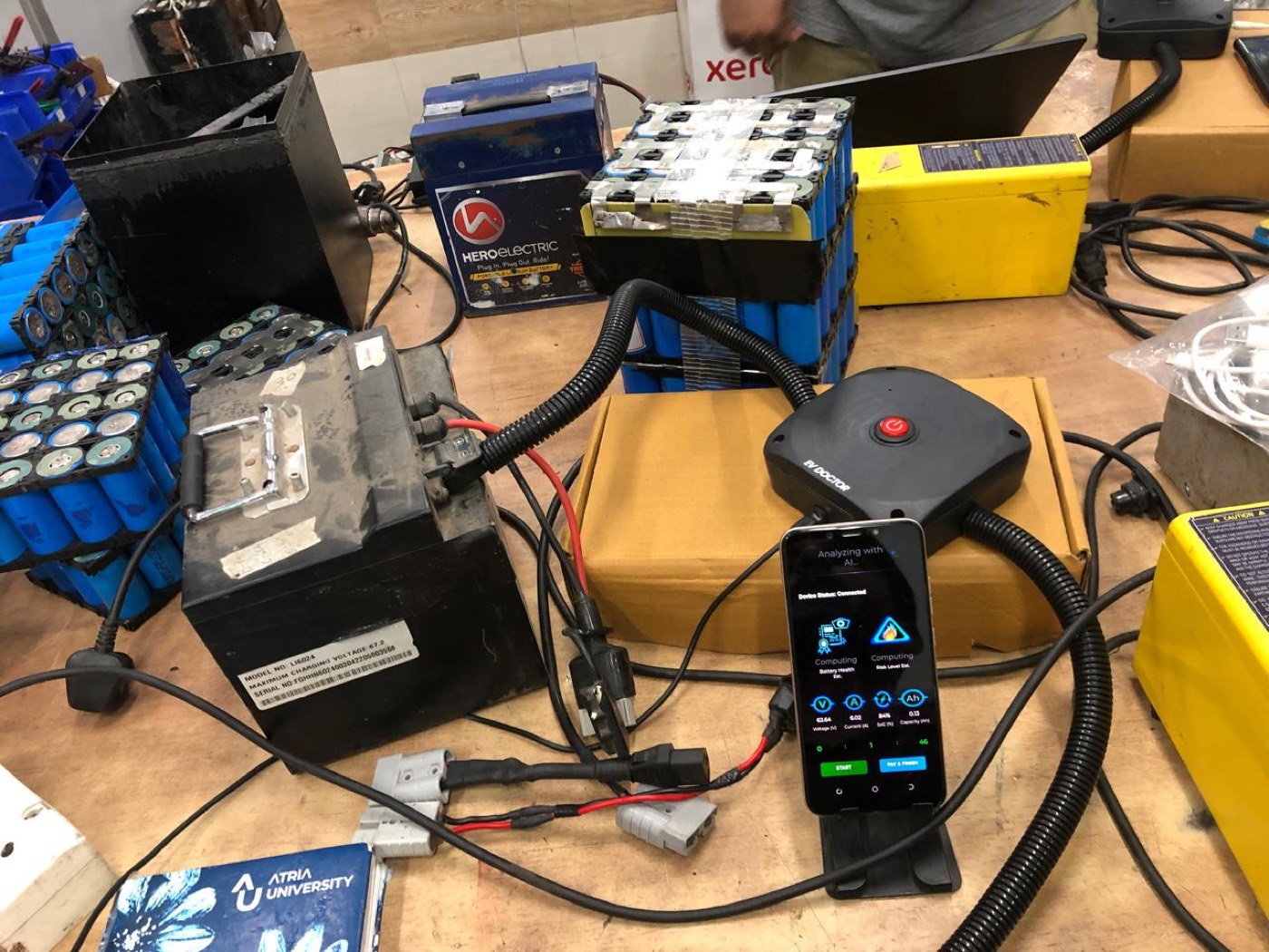 Live EV battery diagnostic session with battery packs and the EV DOCTOR device