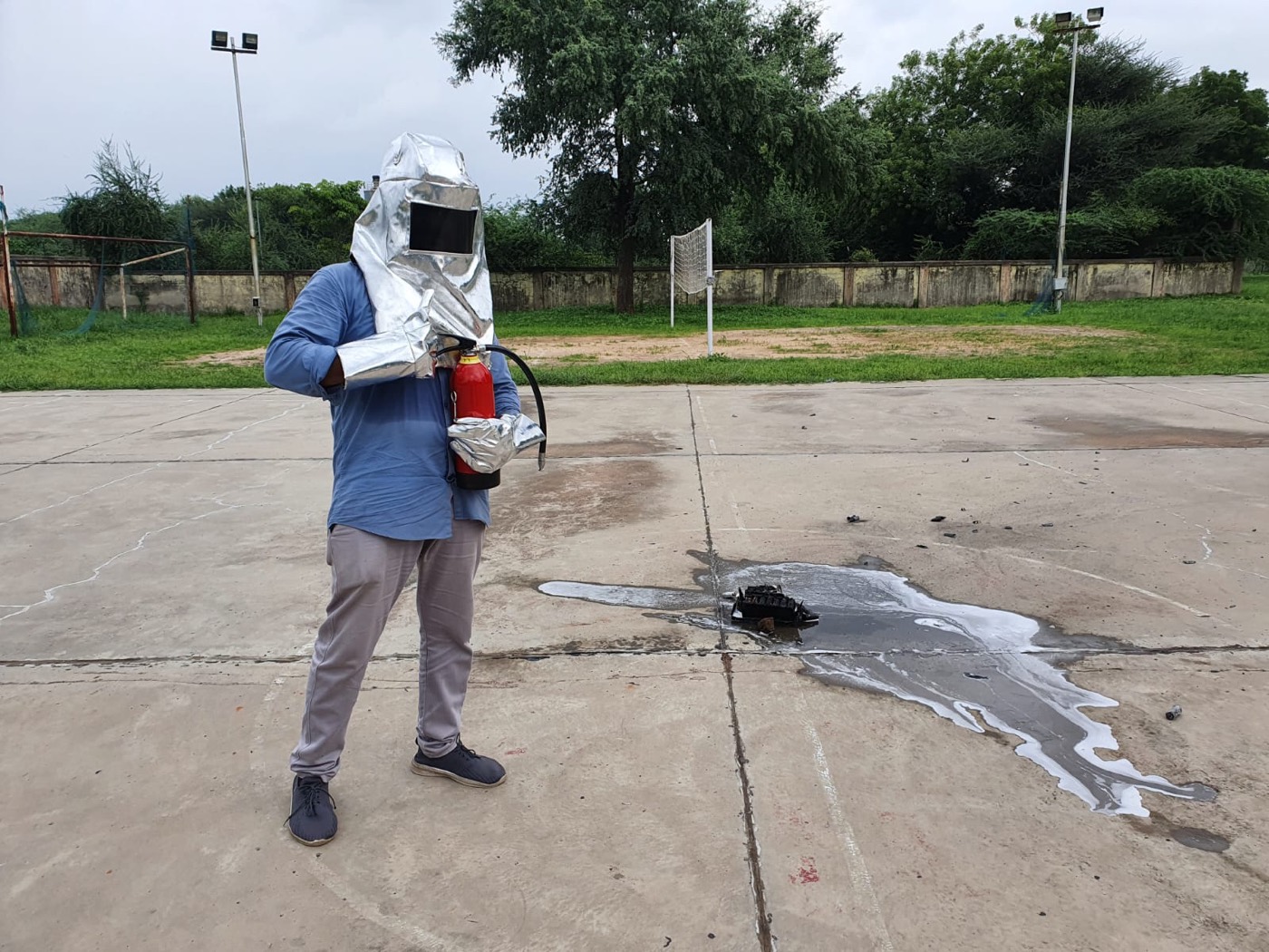 Controlled battery safety test response with protective equipment